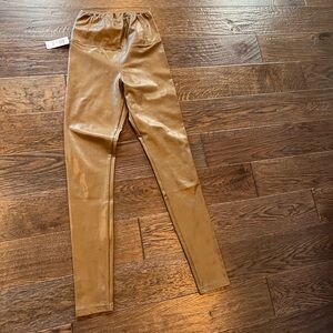 New with tags.  Bought the wrong size.  Never worn.  Perfect condition.